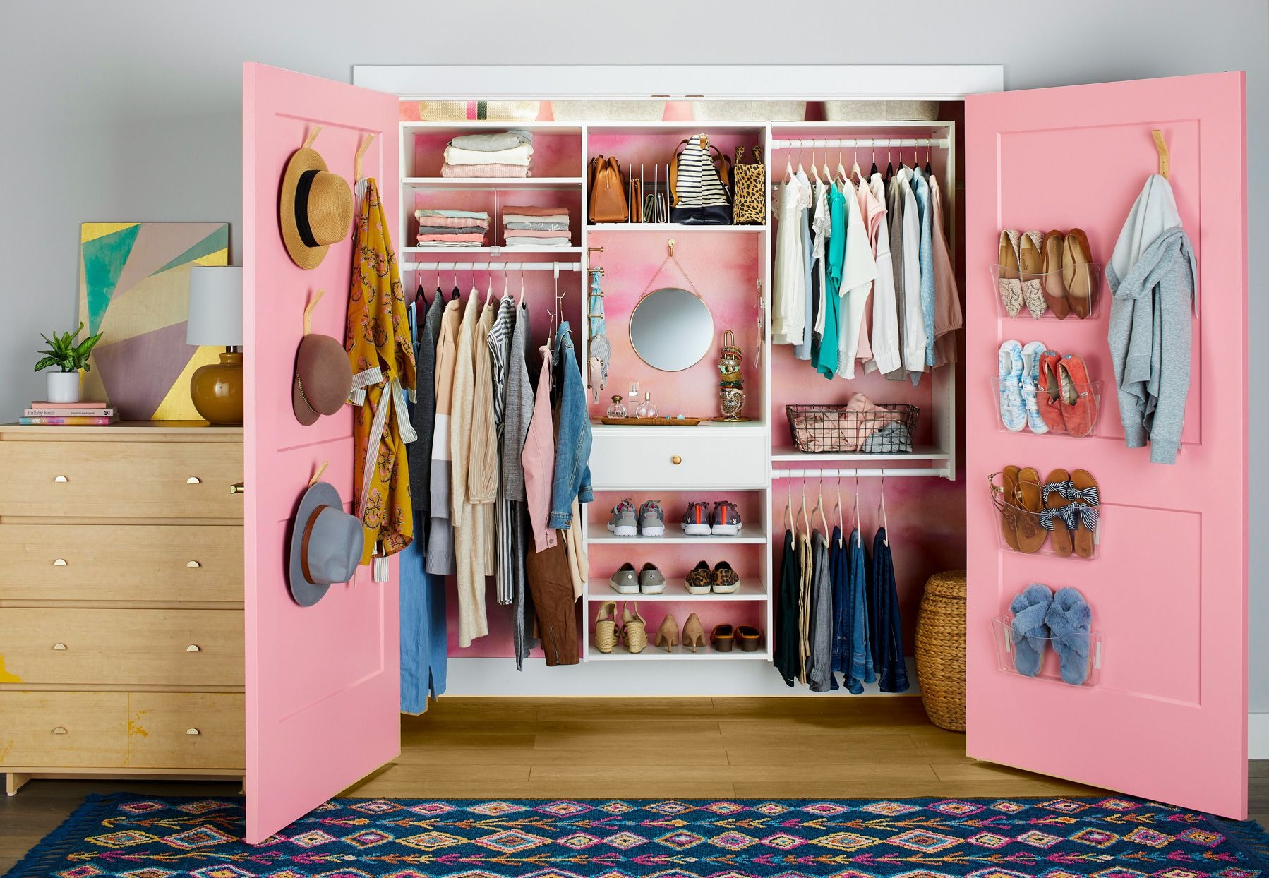 Dakota Store -Dakota Store pink organized closet open doors